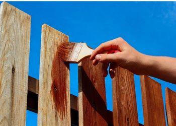 Paint a Wood Fence to Extend the Life of the Wood and Upgrade the Look of Your Fence
